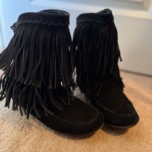 Minnetonka black fringe boots . Size 8.